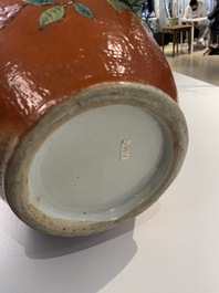 A Chinese famille rose 'sanduo' vase with applied design on a coral red ground, 19th C.