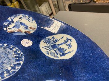 A Chinese blue, white and copper-red powder-blue-ground dish, Kangxi