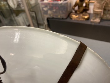 A Chinese blue, white and copper-red powder-blue-ground dish, Kangxi