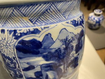 A Chinese blue and white 'gu' vase with floral and lanscape panels, Kangxi