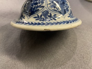 A Chinese blue and white vase and cover with floral design, Kangxi