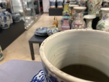 A Chinese blue and white vase and cover with floral design, Kangxi