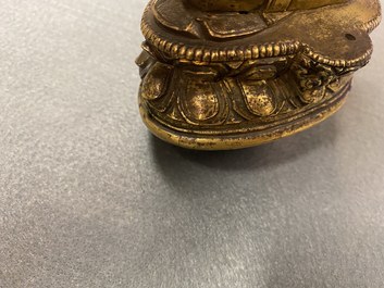 A Chinese gilt bronze 'Medicine Buddha' figure, 17/18th C.