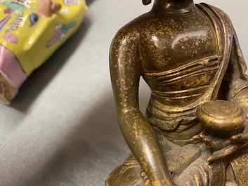 A Chinese gilt bronze 'Medicine Buddha' figure, 17/18th C.
