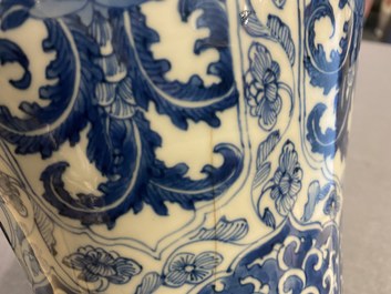 A Chinese blue and white vase and cover with floral design, Kangxi