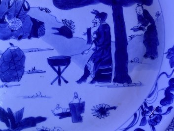 A Chinese blue and white 'musicians' dish, Kangxi