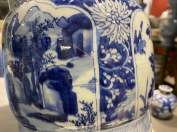 A Chinese blue and white 'gu' vase with floral and lanscape panels, Kangxi