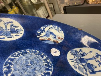 A Chinese blue, white and copper-red powder-blue-ground dish, Kangxi