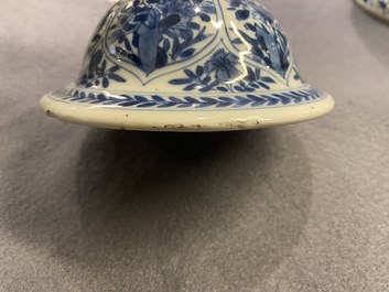 A Chinese blue and white vase and cover with floral design, Kangxi