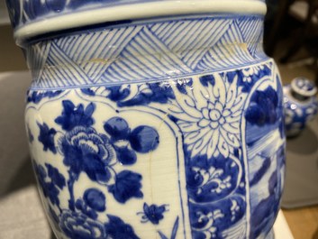 A Chinese blue and white 'gu' vase with floral and lanscape panels, Kangxi