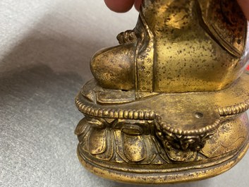 A Chinese gilt bronze 'Medicine Buddha' figure, 17/18th C.