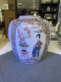 A pair of Chinese famille verte jars and covers, Kangxi