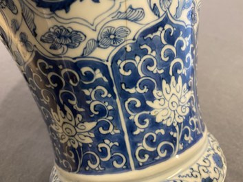 A Chinese blue and white vase and cover with floral design, Kangxi