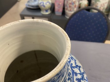 A Chinese blue and white vase and cover with floral design, Kangxi