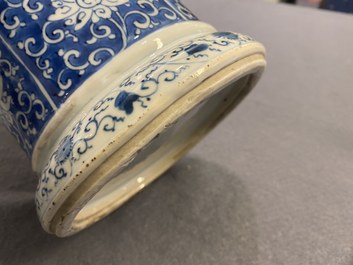 A Chinese blue and white vase and cover with floral design, Kangxi