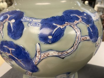 A Chinese blue, white and copper-red celadon-ground vase, Kangxi