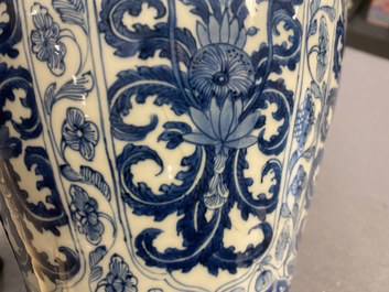 A Chinese blue and white vase and cover with floral design, Kangxi