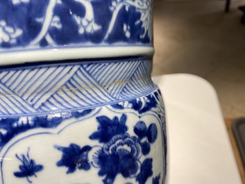 A Chinese blue and white 'gu' vase with floral and lanscape panels, Kangxi