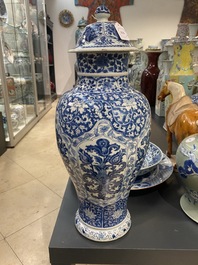 A Chinese blue and white vase and cover with floral design, Kangxi