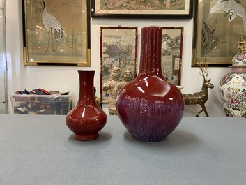 Two Chinese monochrome sang de boeuf-glazed bottle vases, 19th C.