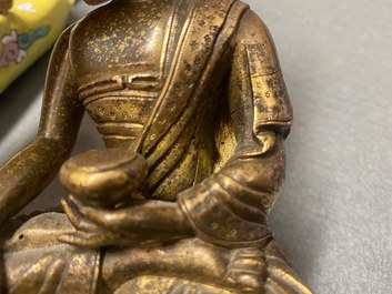 A Chinese gilt bronze 'Medicine Buddha' figure, 17/18th C.