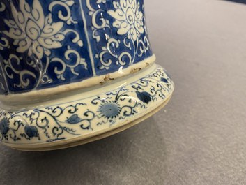 A Chinese blue and white vase and cover with floral design, Kangxi