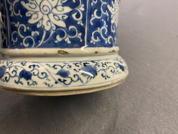A Chinese blue and white vase and cover with floral design, Kangxi