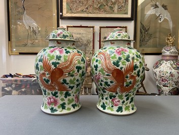 A pair of Chinese famille rose 'dragon and phoenix' vases, 19th C.