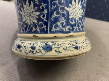 A Chinese blue and white vase and cover with floral design, Kangxi