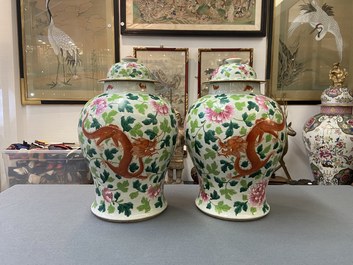 A pair of Chinese famille rose 'dragon and phoenix' vases, 19th C.