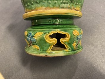 Une paire de porte-encens en forme de lions bouddhistes en biscuit &eacute;maill&eacute; sancai, Ming