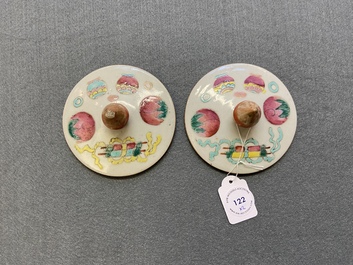 A pair of Chinese famille rose 'antiquities' jars and covers, 19th C.
