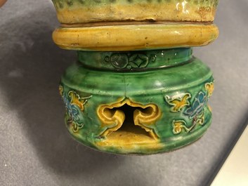 Une paire de porte-encens en forme de lions bouddhistes en biscuit &eacute;maill&eacute; sancai, Ming