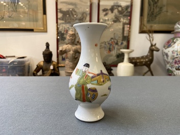 A Chinese famille rose vase with a man and a woman in a garden, Yongzheng