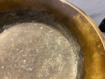 A large Chinese bronze tripod censer with chilong handles, Xuande mark, 18/19th C.