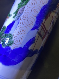A Chinese wucai rouleau vase and a blue, white and copper-red vase, 19/20th C.