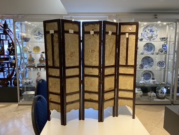 A Chinese five-fold wooden screen with famille rose plaques, 19th C.
