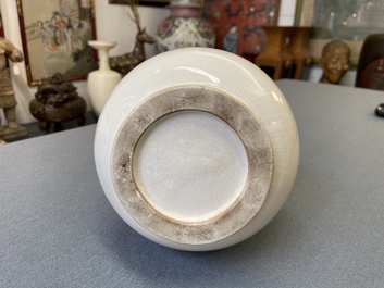 A Chinese Dehua blanc de Chine vase with applied dragon, Kangxi/Yongzheng