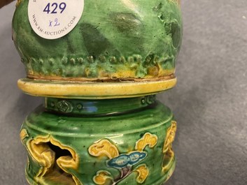 Une paire de porte-encens en forme de lions bouddhistes en biscuit &eacute;maill&eacute; sancai, Ming