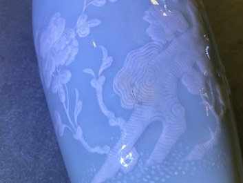 A Chinese monochrome blue censer and a white slip-decorated celadon vase, 18/19th C.