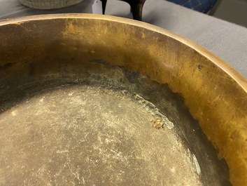 A large Chinese bronze tripod censer with chilong handles, Xuande mark, 18/19th C.