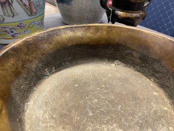 A large Chinese bronze tripod censer with chilong handles, Xuande mark, 18/19th C.
