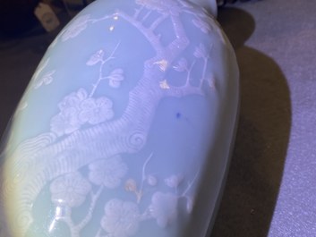 A Chinese monochrome blue censer and a white slip-decorated celadon vase, 18/19th C.