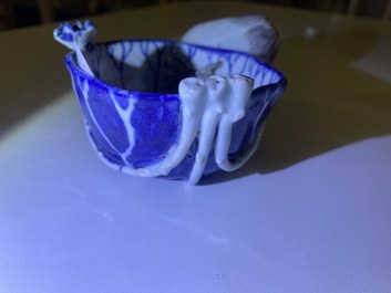 A Chinese blue, white and copper-red 'crab in lotus' water dropper, Kangxi