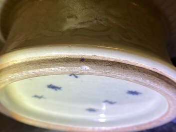A Chinese monochrome celadon-glazed 'yuhuchunping' vase with underglaze floral design, Kangxi mark, 19th C.