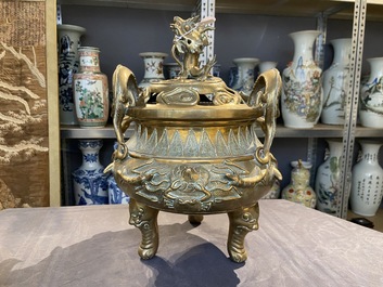 A large Chinese bronze censer and cover on stand with sea animals and shells, Qing