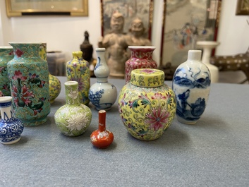 Twenty-eight Chinese blue and white and famille rose minature vases, Kangxi and later