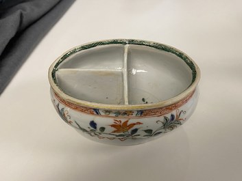A Chinese doucai bowl, a famille verte spice box and a wucai tea caddy, Kangxi and later
