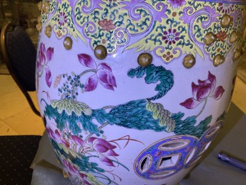 A Chinese famille rose 'ducks in a lotus pond' garden seat, 19th C.