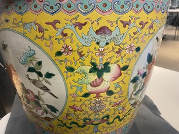 A Chinese famille rose jardini&egrave;re on wooden stand, 19th C.